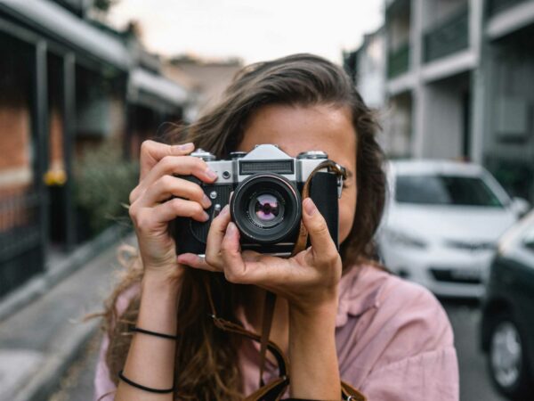 Girl holding camera